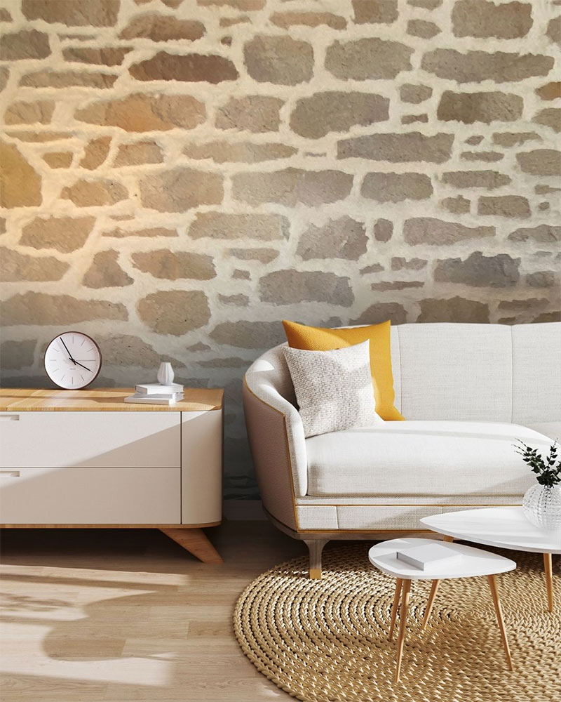 Les murs imitation pierre en enduit s'appliquent aussi en intérieur